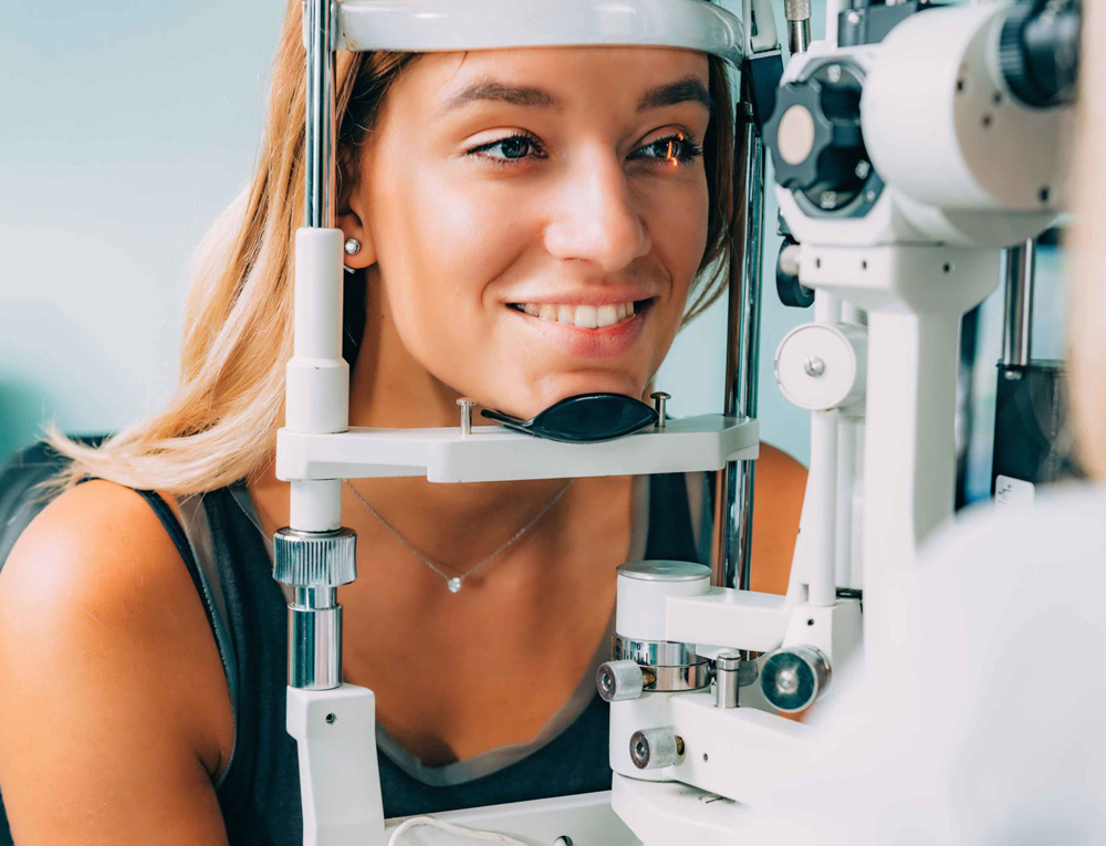 blonde woman getting eye exam